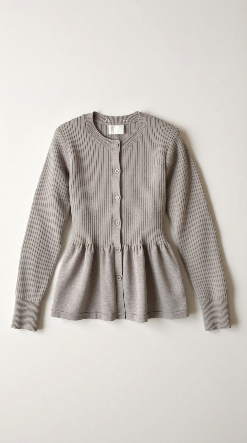 Diana | Cárdigan peplum abotonado